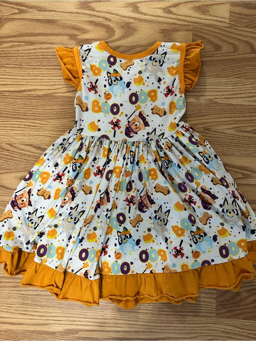 Girls Halloween 'Boo' Ruffle Dress in Orange and White